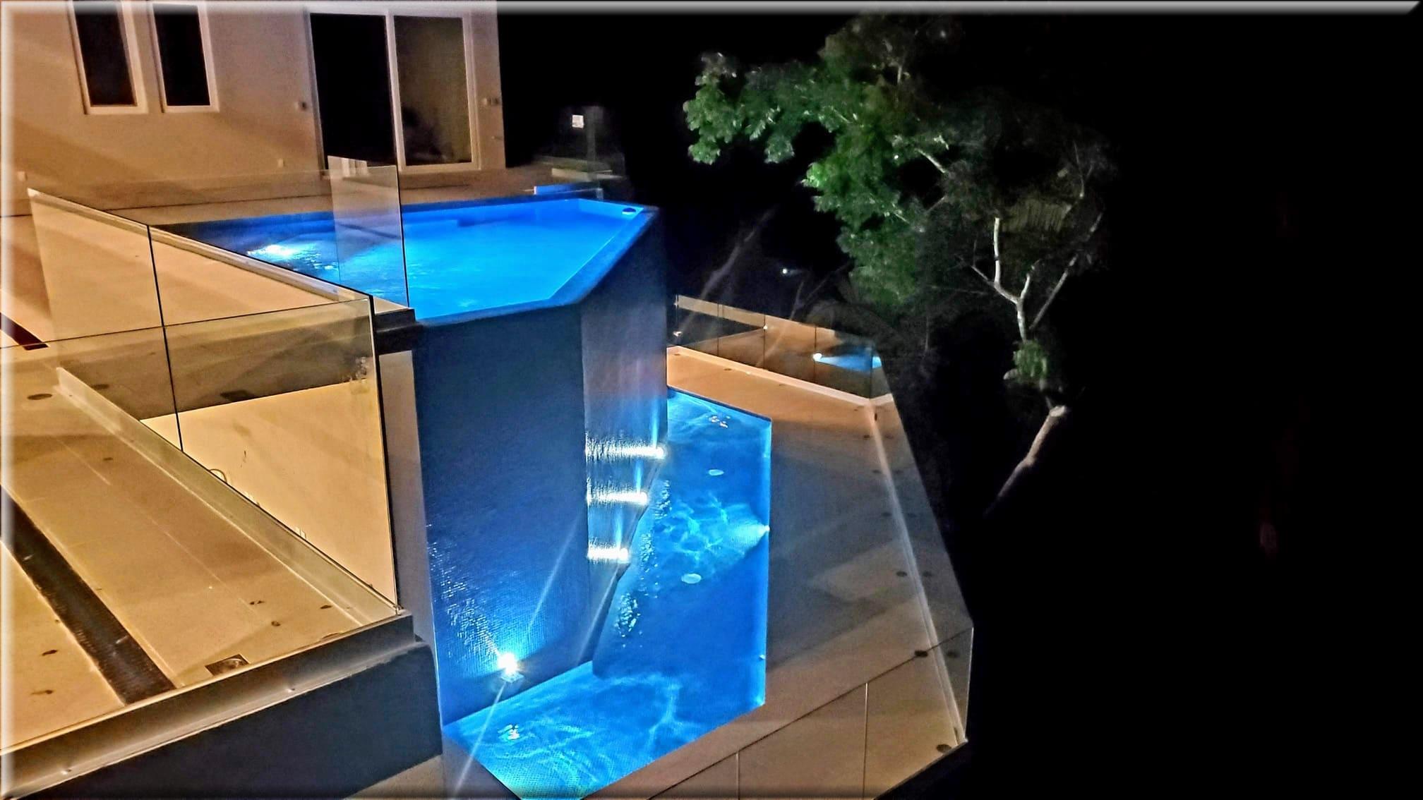 Swimming pool at night at Selva Suites San Pancho rentals